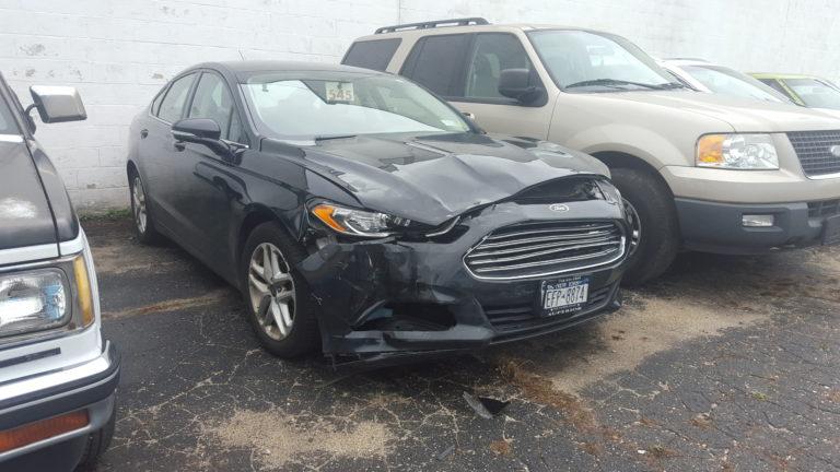 A vehicle in need of frame straightening after an accident